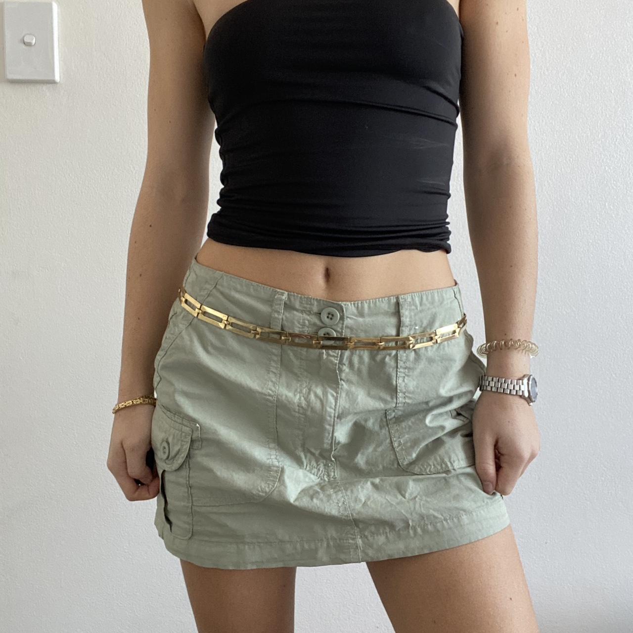 The perfect green mini cargo skirt from Glassons.... Depop