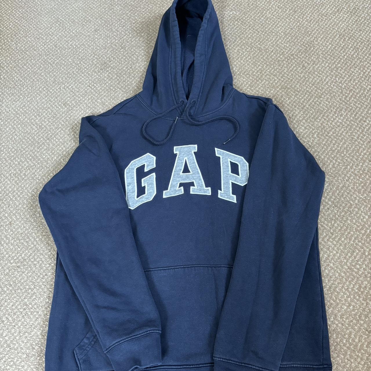 navy gap hoodie with grey spell out. fits 6-10... - Depop