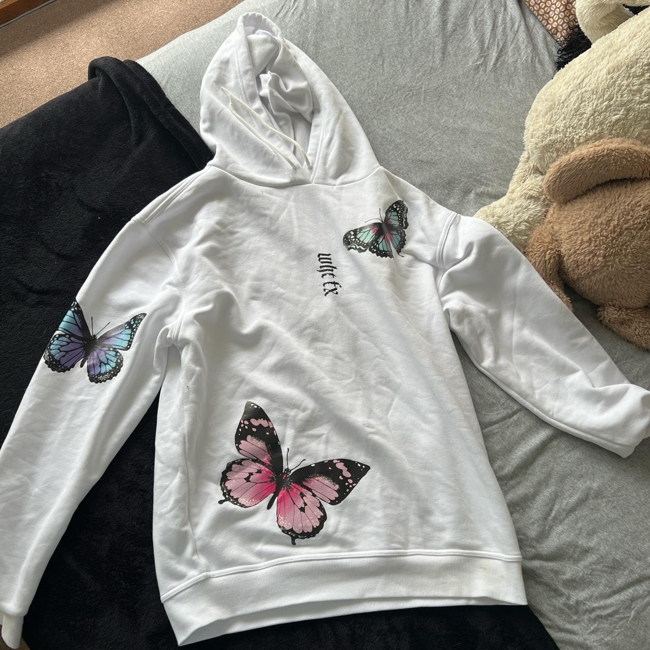 White fox butterfly hoodie. Has a little mark on the... - Depop