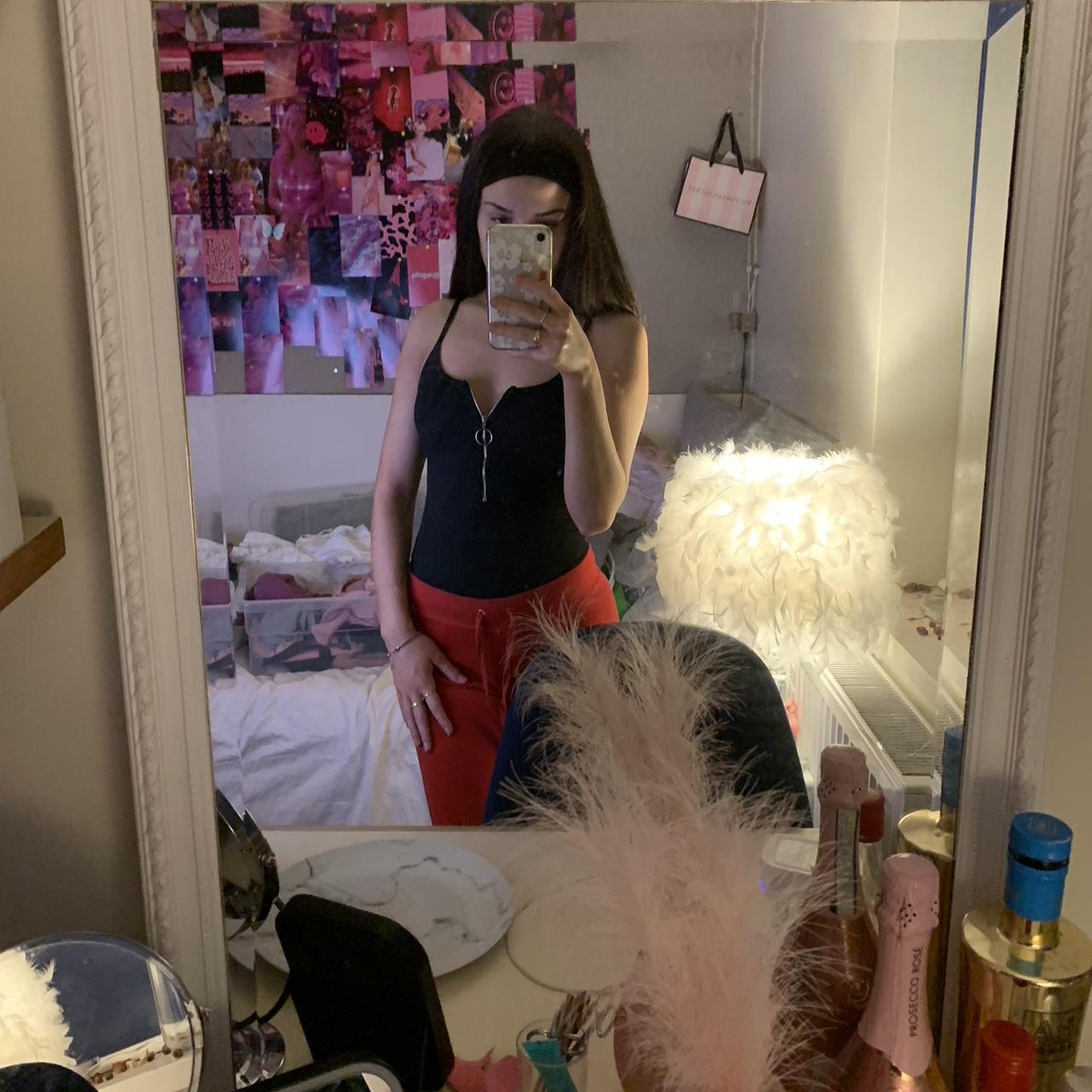 Black zip up bodysuit ️Size small ️Good condition - Depop