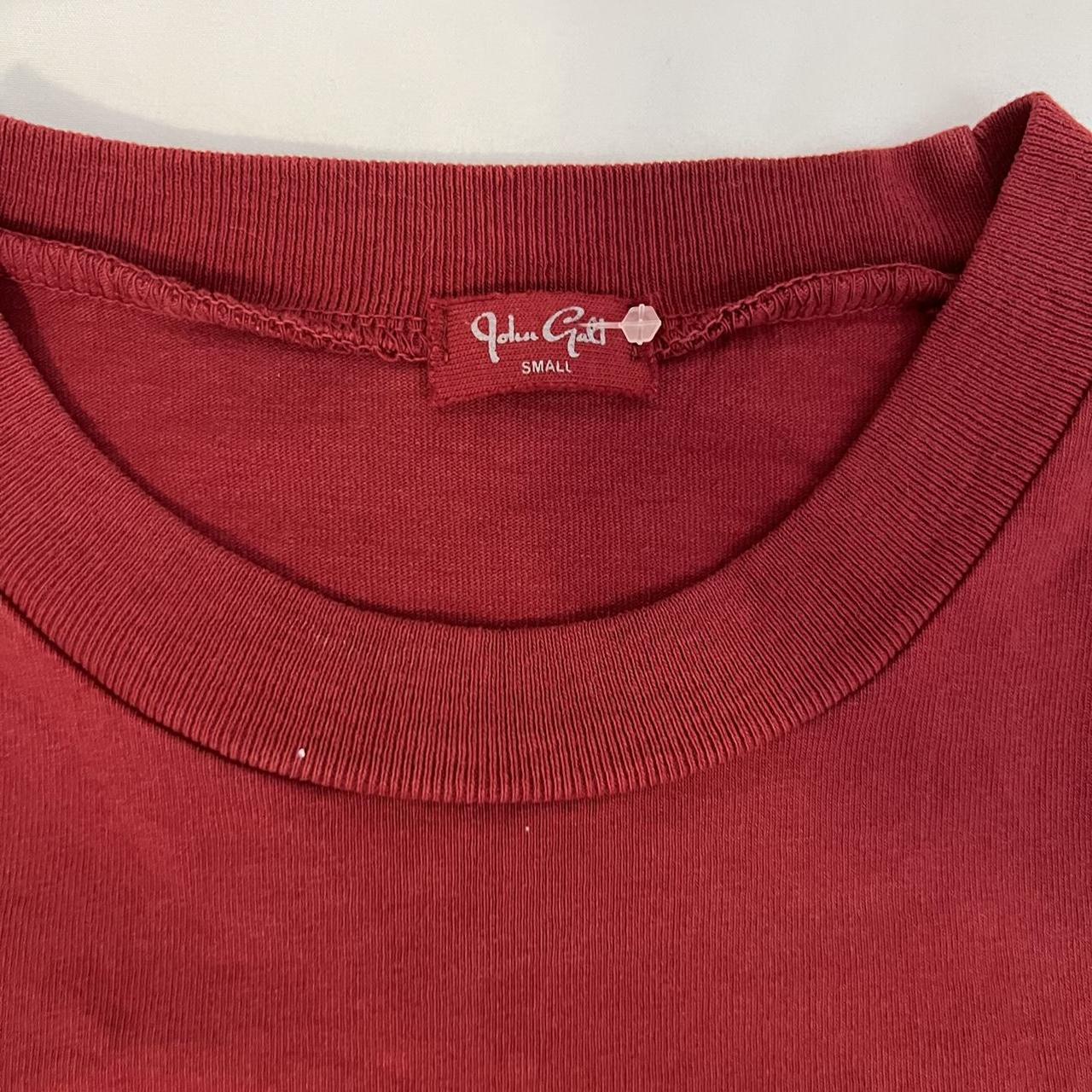 brandy melville new york top red baby tee with a... Depop