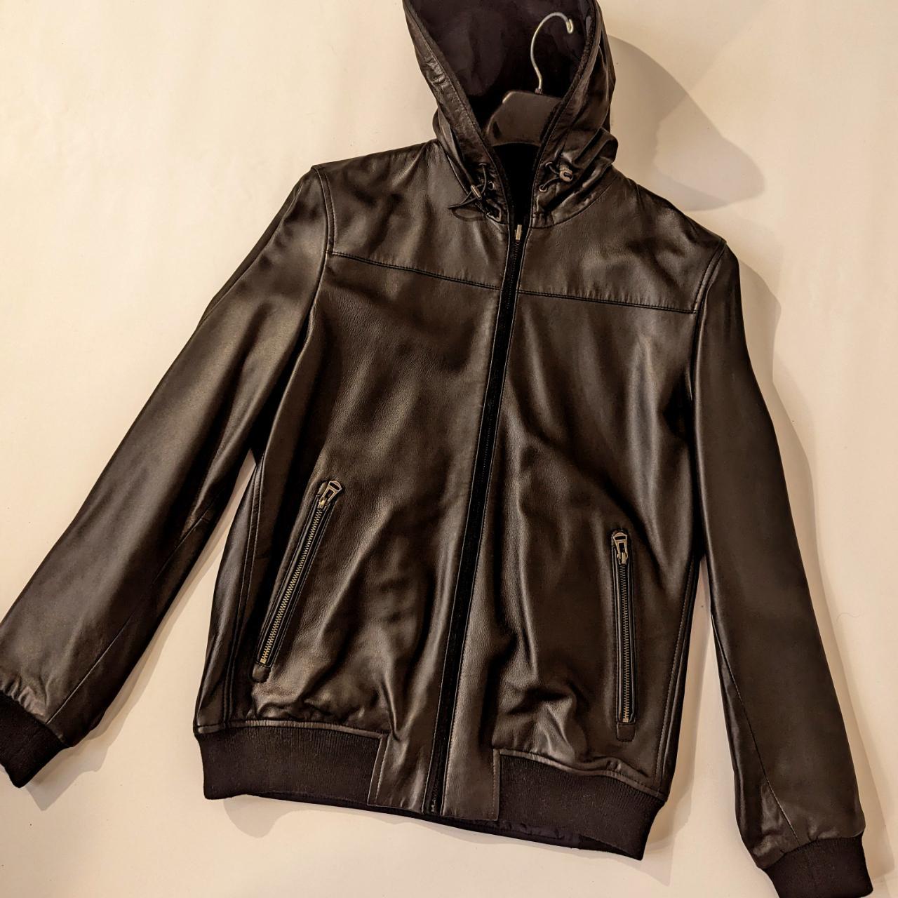 A smooth leather shell hoodie and reversible style