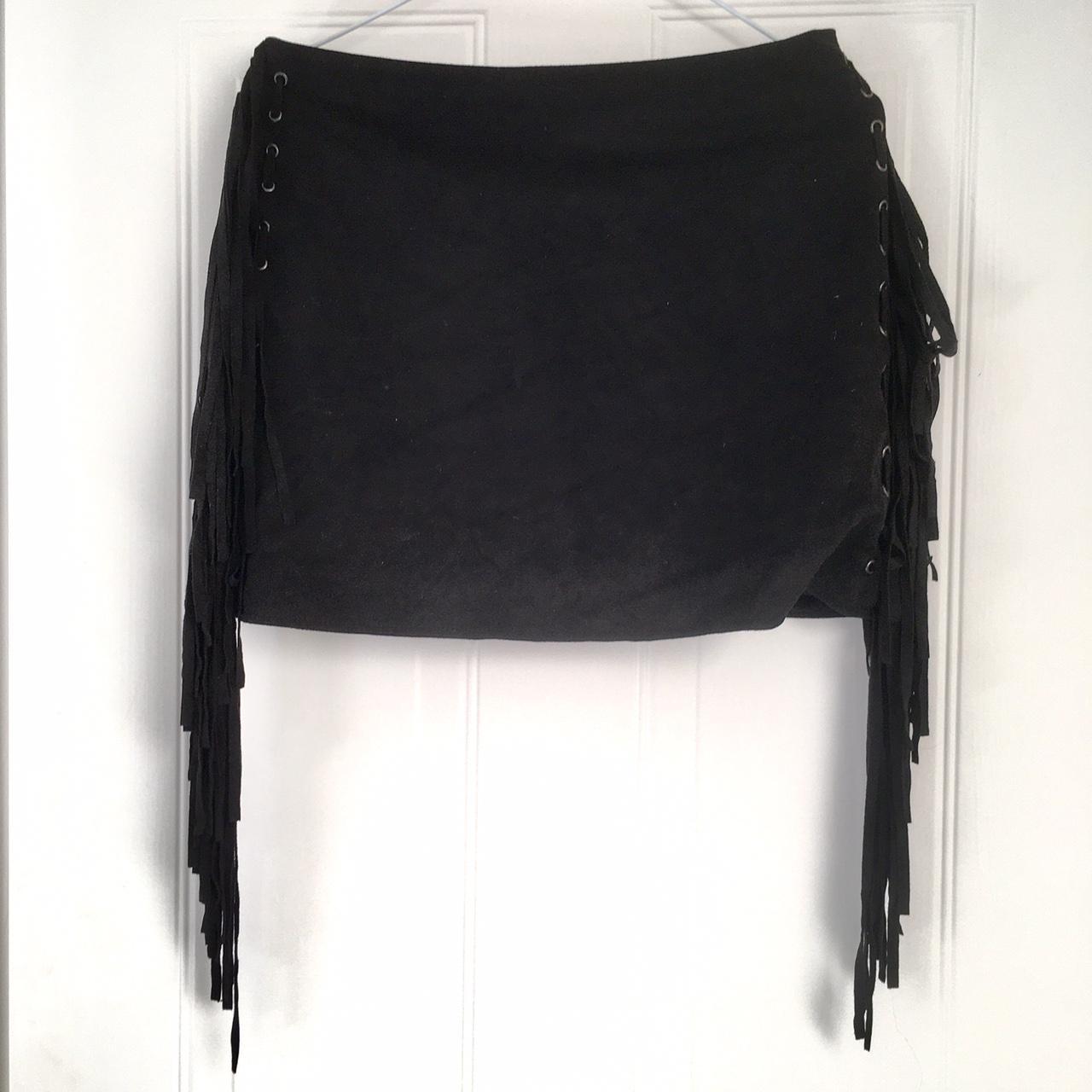 Black suede mini skirt with fringe tassels along the. Depop