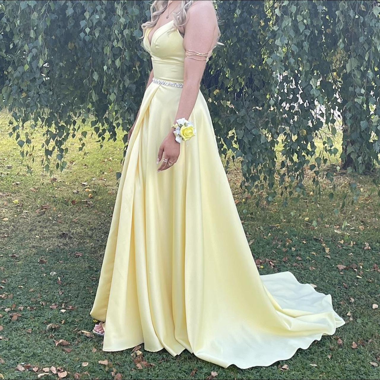 Selling this lemon debs dress with a slit... Depop