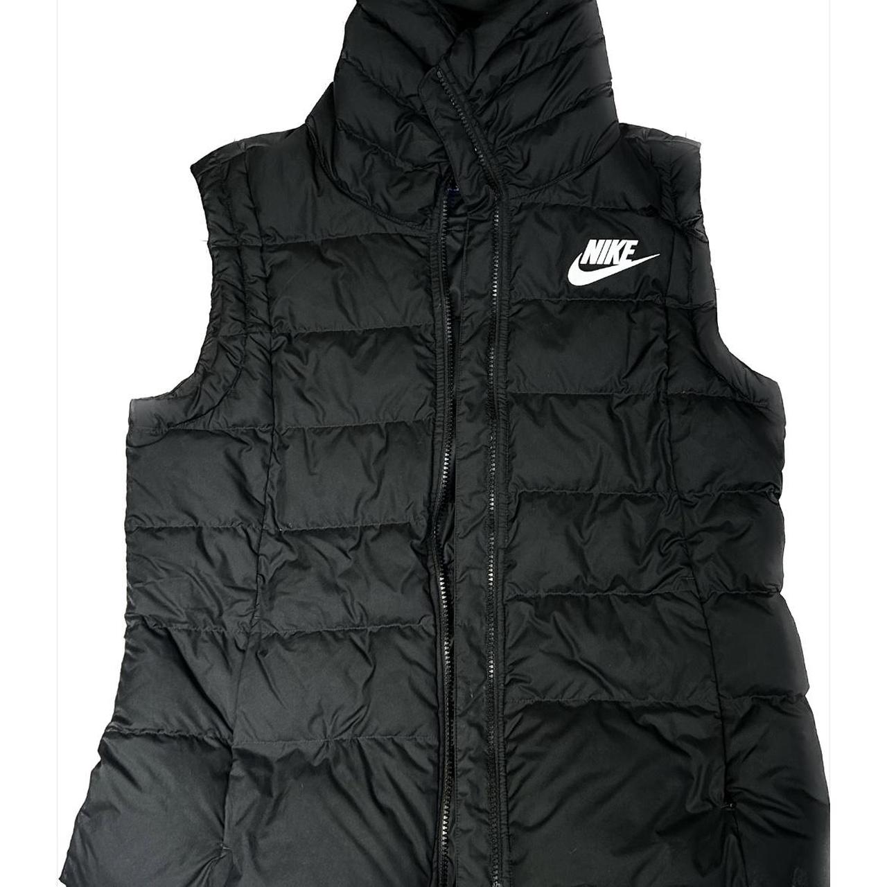 Girls NIKE vest with a little shape cinch at waist