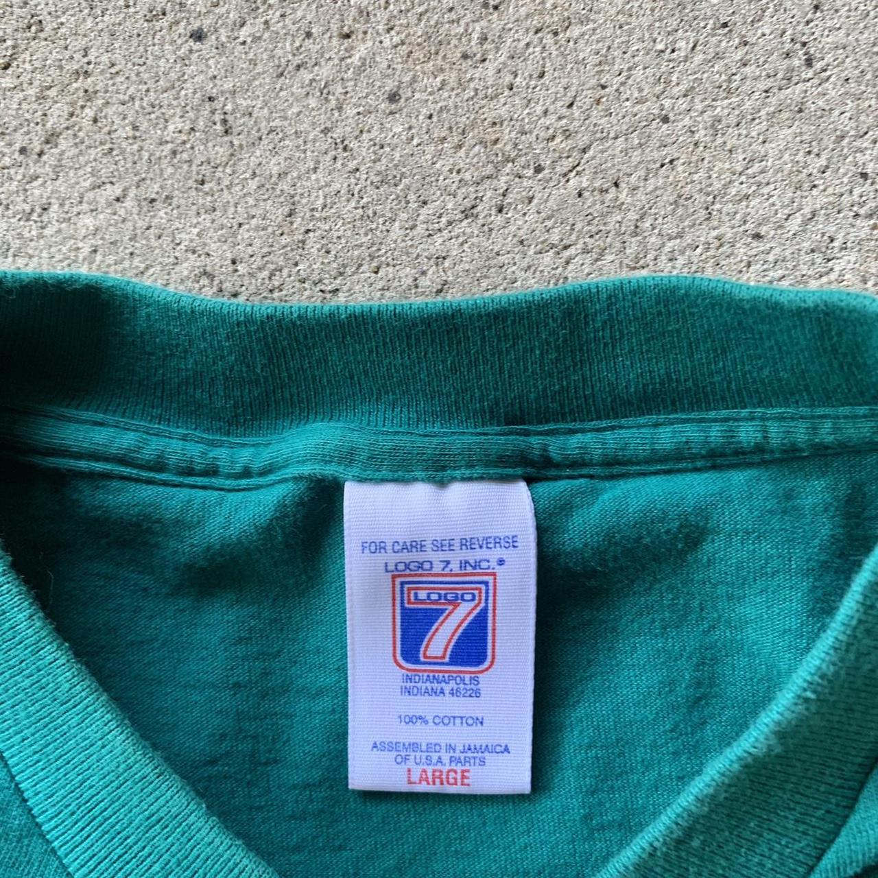 Vintage 90s Champion Miami Dolphins logo t-shirt. Is - Depop