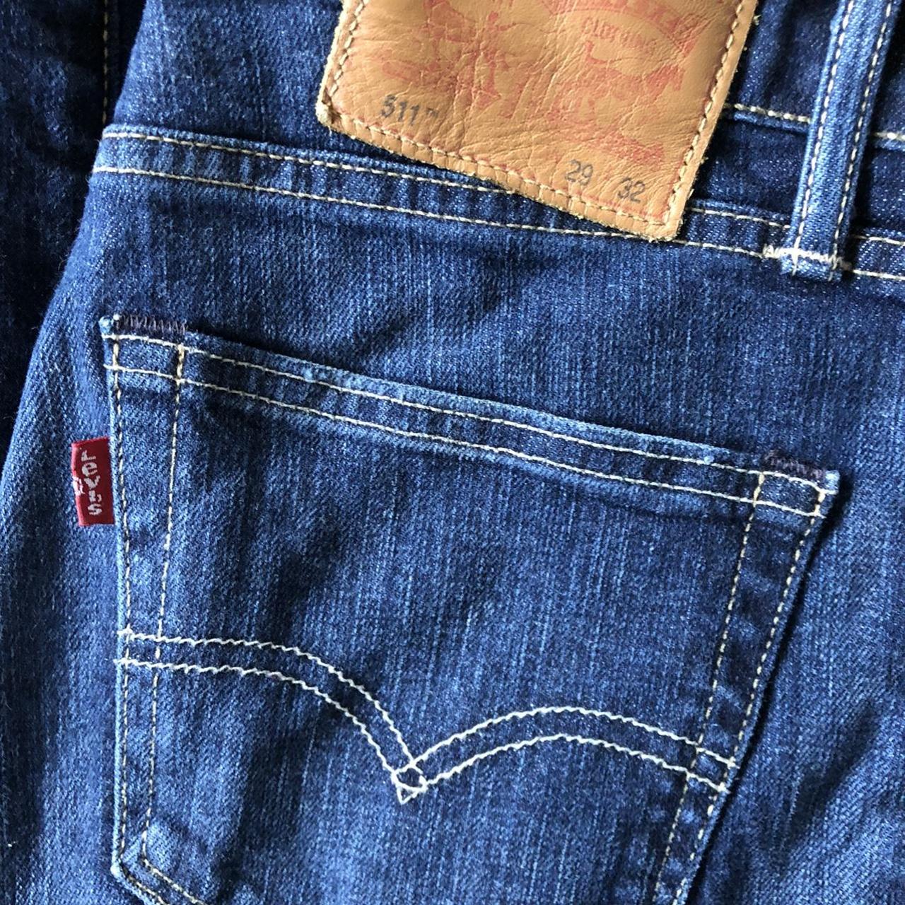 Levi's Men's Blue and Red Jeans | Depop