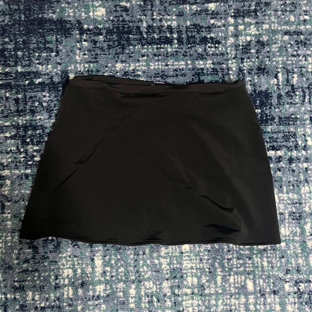 Danielle Guizio Women's Black Skirt | Depop