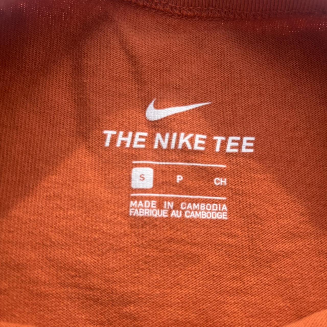 fluorescent orange nike shirt