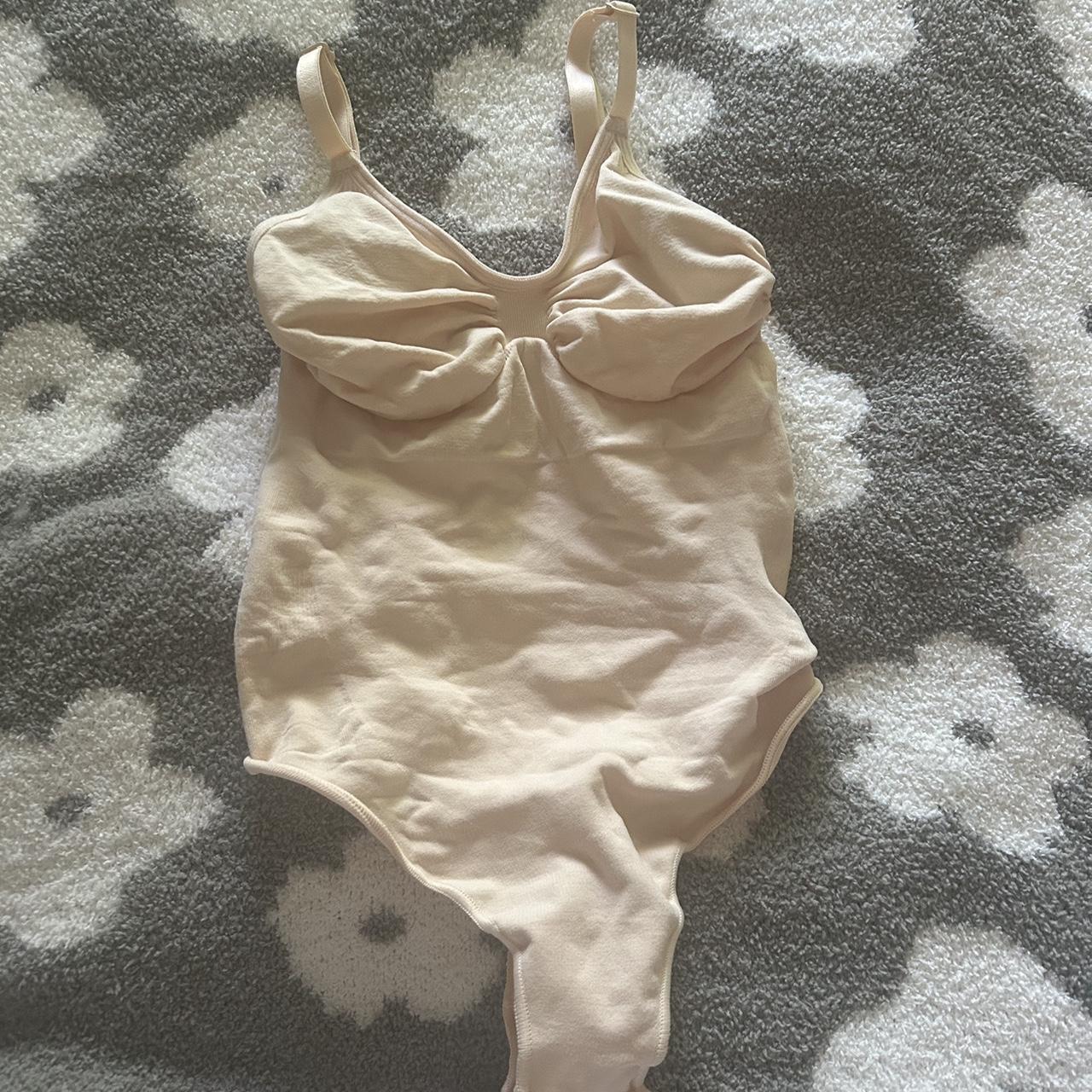 Brand NWOT Skims Bodysuit in size L/XL in shade sand... - Depop