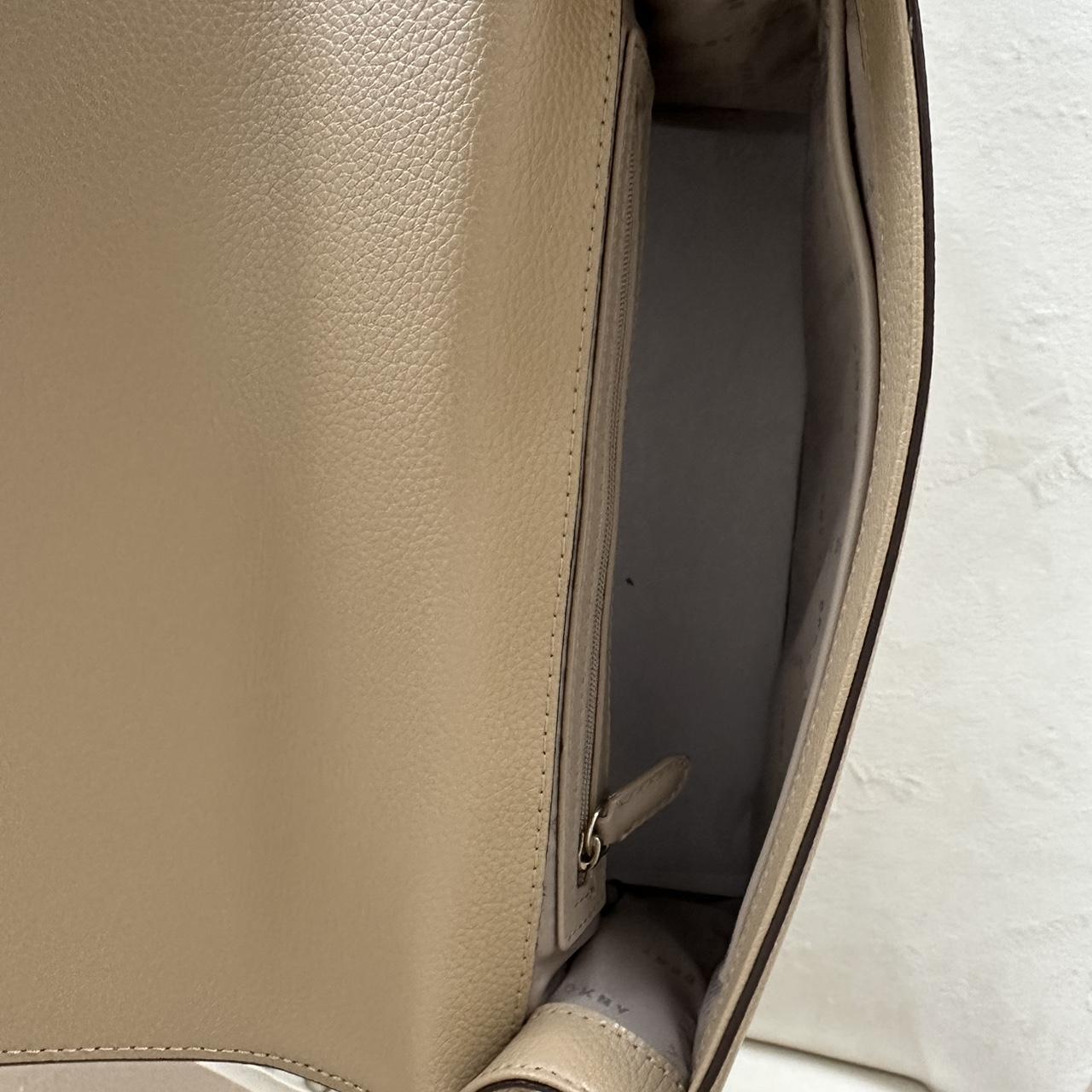 Medium size beige/nude DKNY bag. Used a few times - Depop