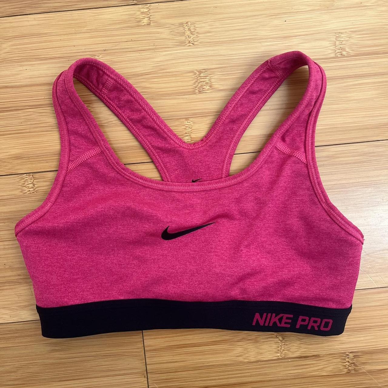 Pink Nike sports bra - Depop