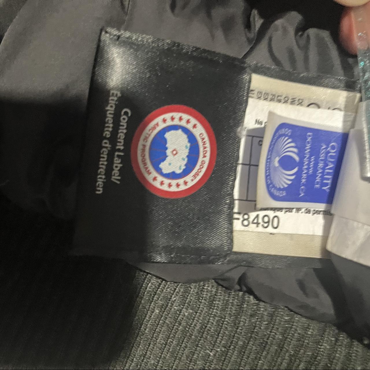 Grey Canada goose bomber jacket few tears on the... - Depop