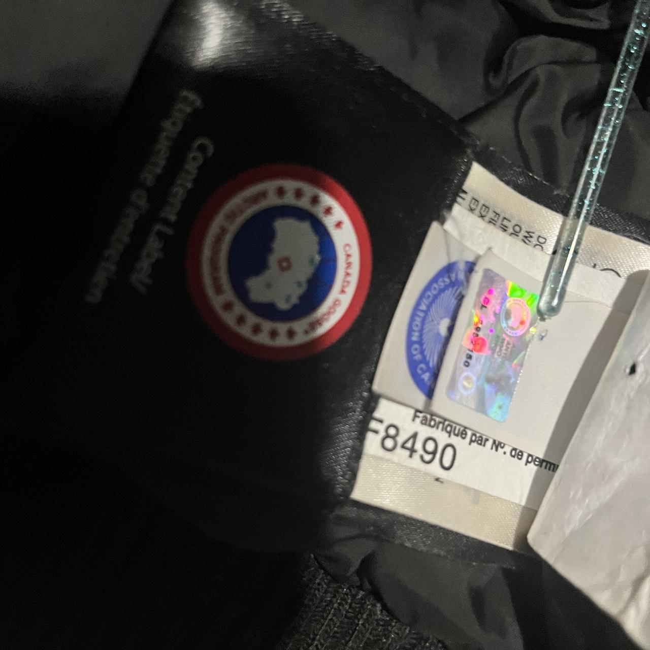 Grey Canada goose bomber jacket few tears on the... - Depop