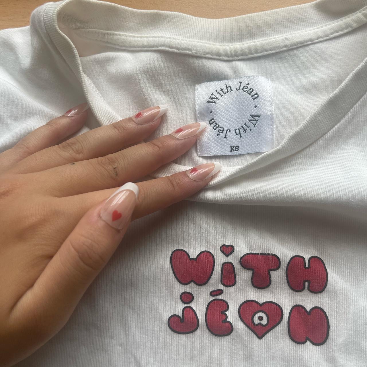 With Jean white baby tee Xs $35 ON HOLD DO NOT BUY!! - Depop