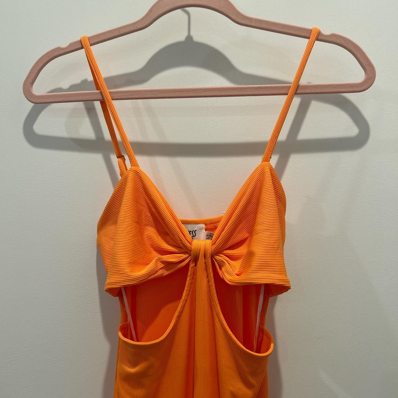 beautiful orange midi dress with cutouts and leg... - Depop