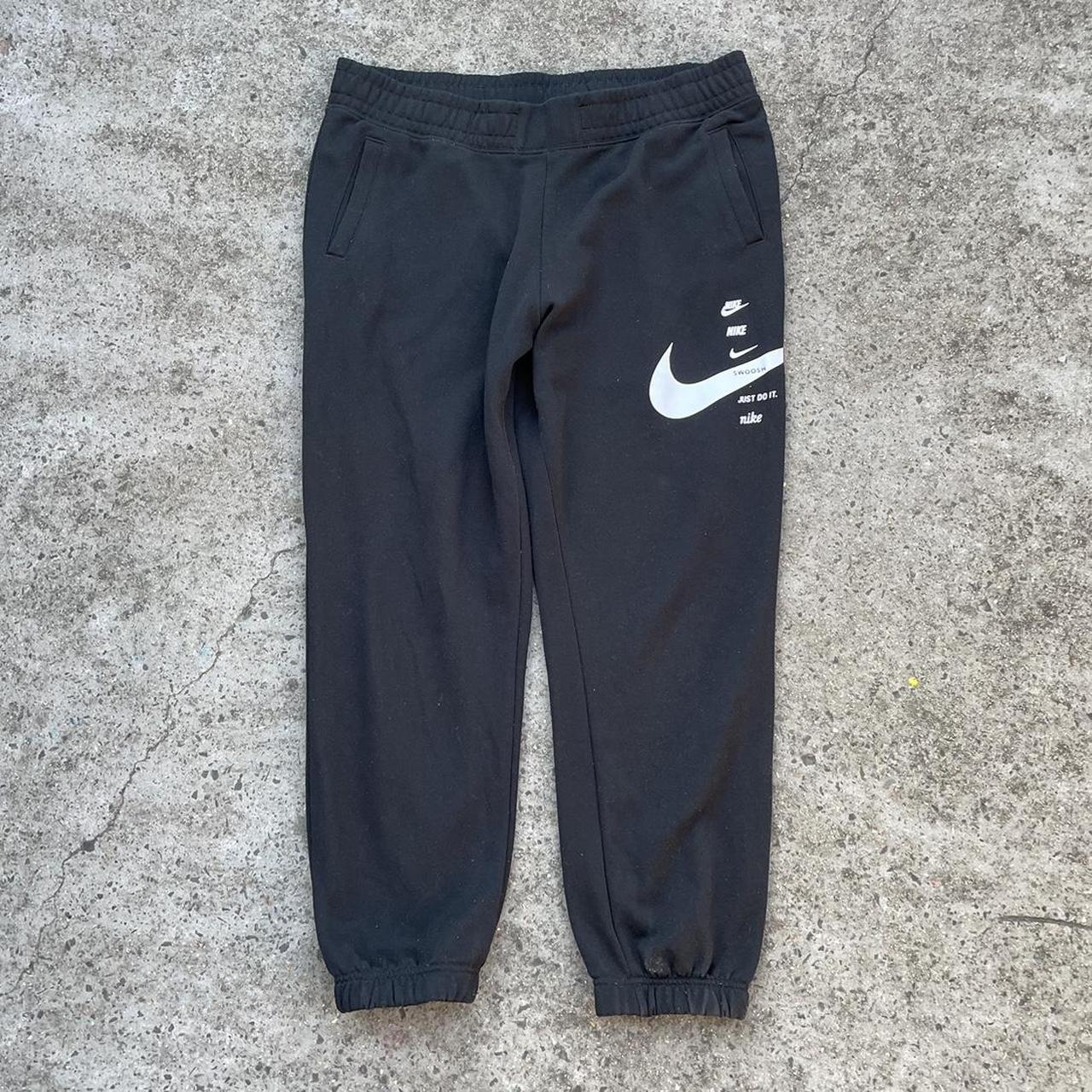 Vintage Nike black jogger style track pants. Two hip... - Depop