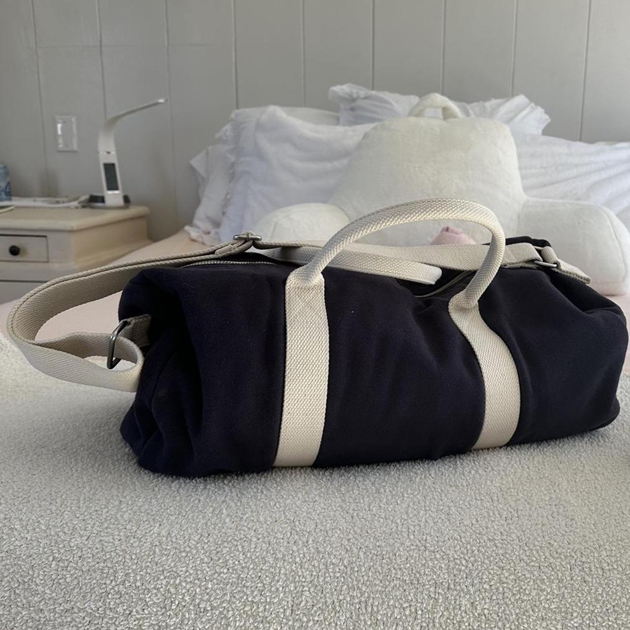 Brandy Melville duffel bag navy and white , used,... Depop