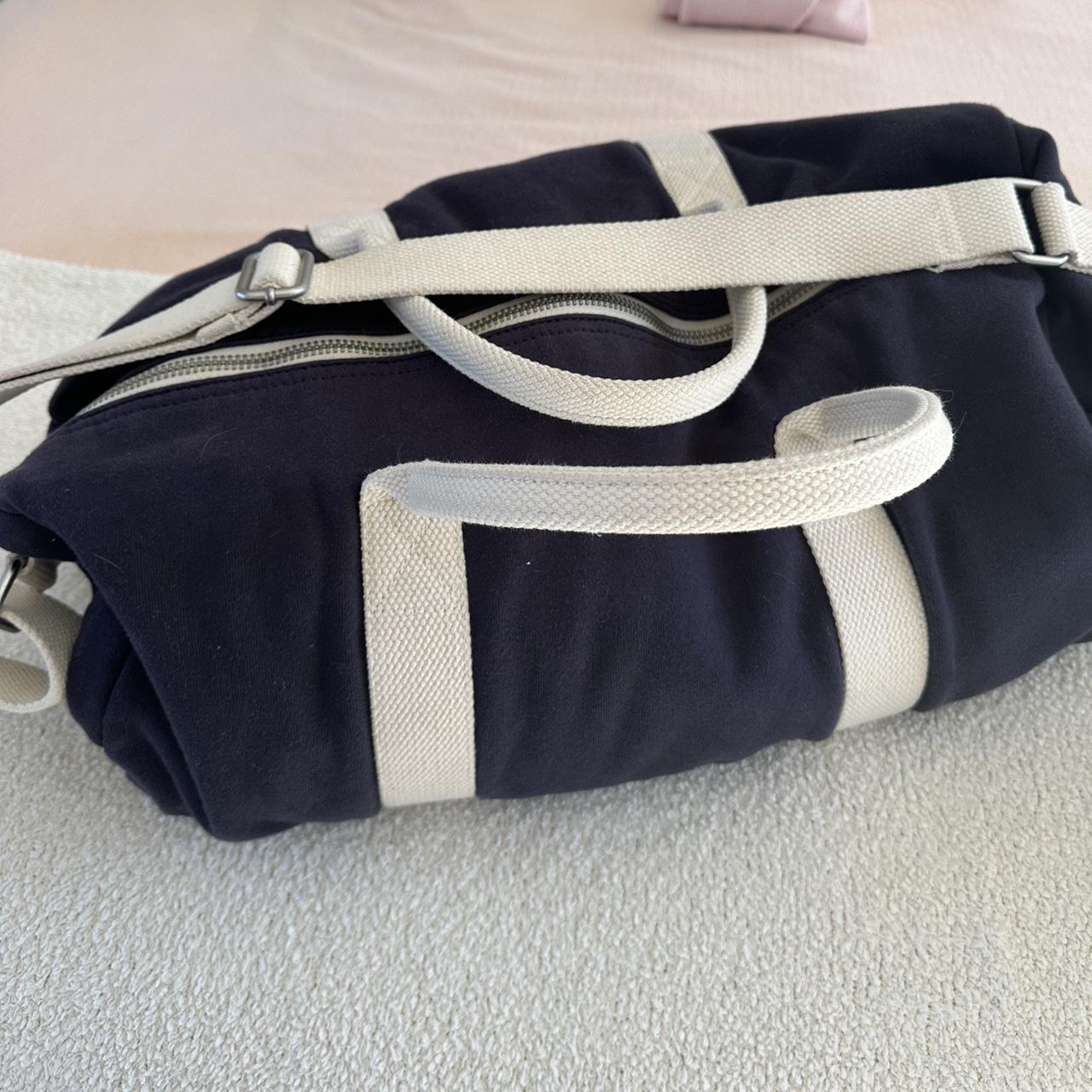 Brandy Melville duffel bag navy and white , used,... Depop