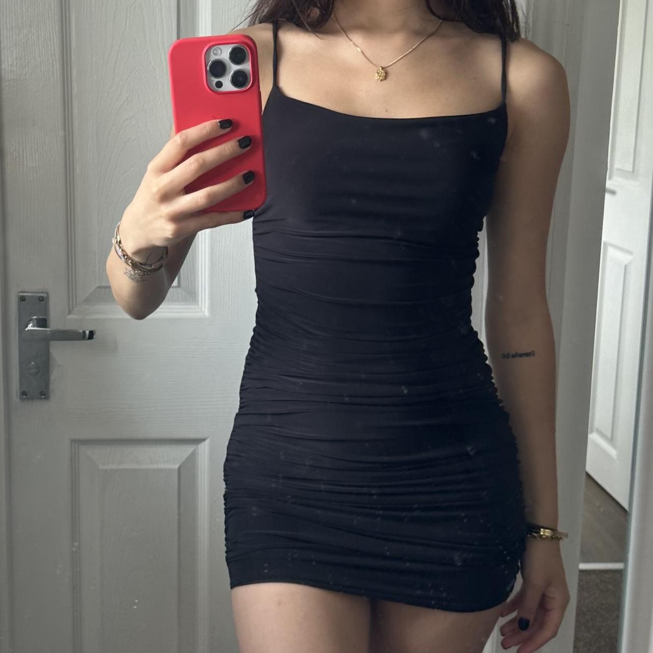 Black ruched bodycon mini dress Size: XS I Saw It... - Depop