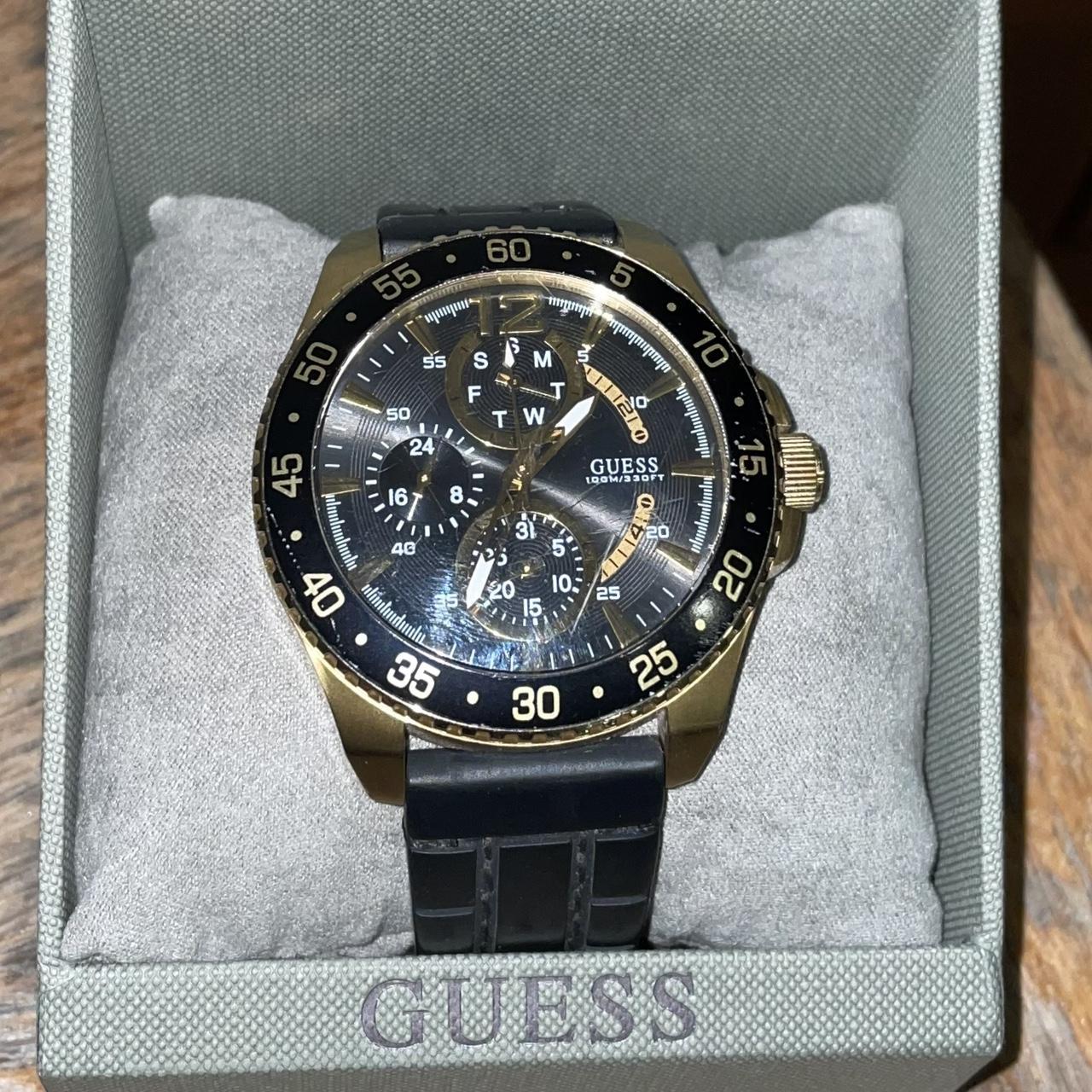 guess black sneakers with gold