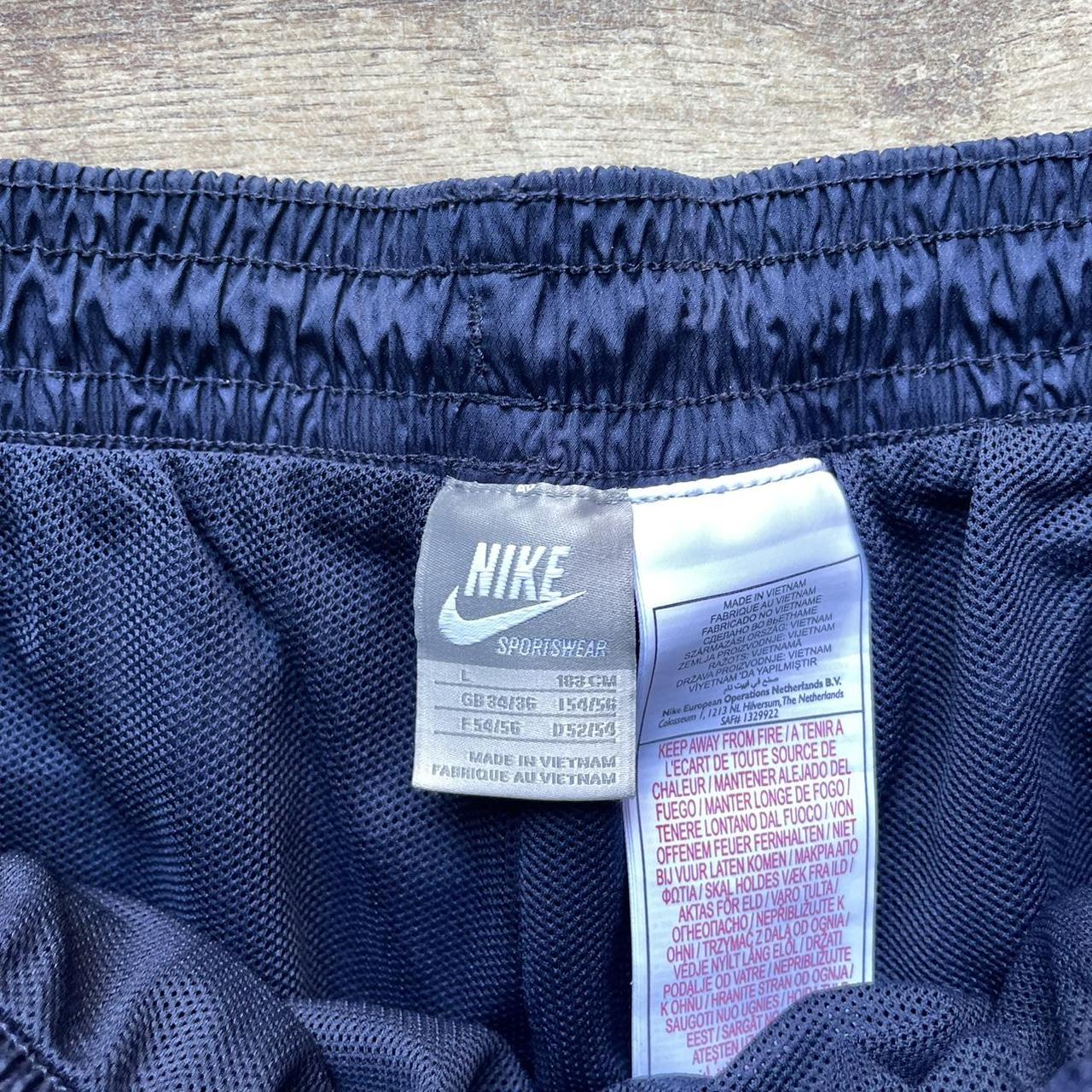 Vintage Nike Shell Baggy Track Bottoms in Navy Size... - Depop