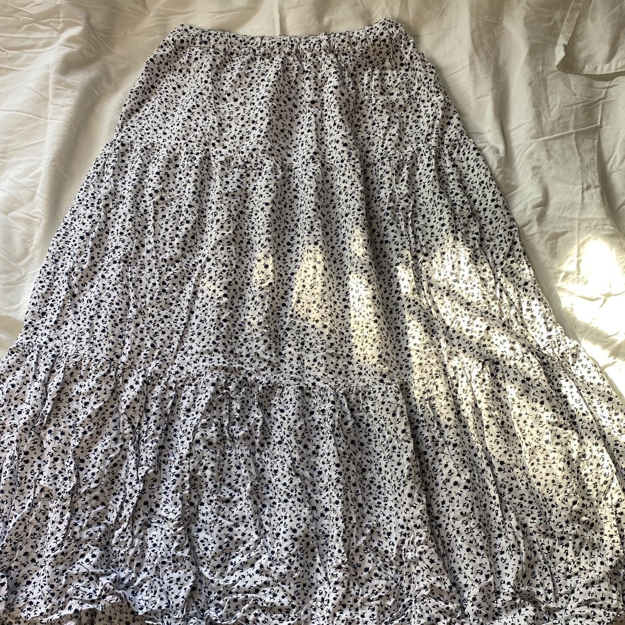 Cute floral white long skirt. It has a three pleates... - Depop