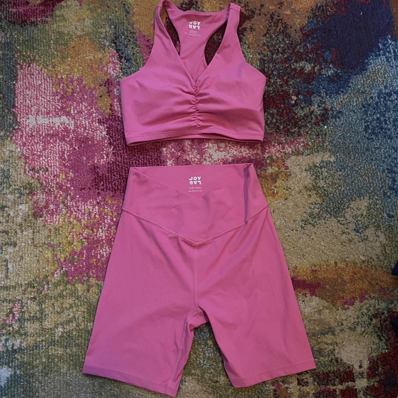 Pink ultimate leggings with matching sports bra.