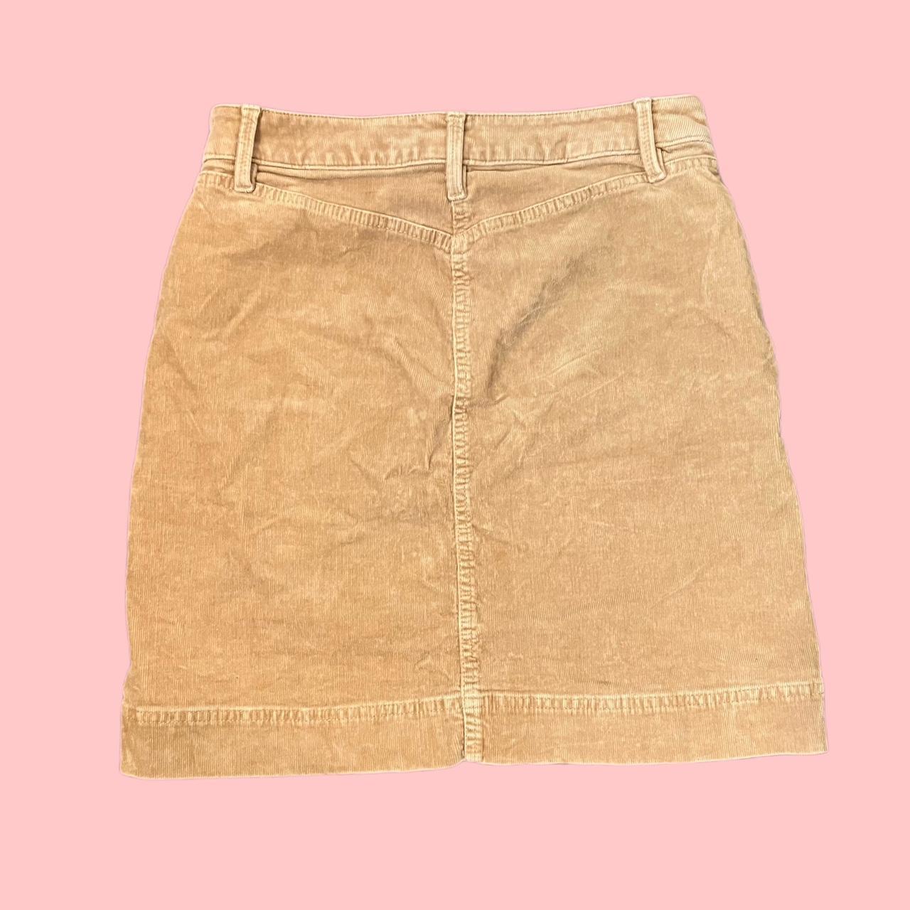 Tan colored midi skirt w pockets Size 2p Length... Depop