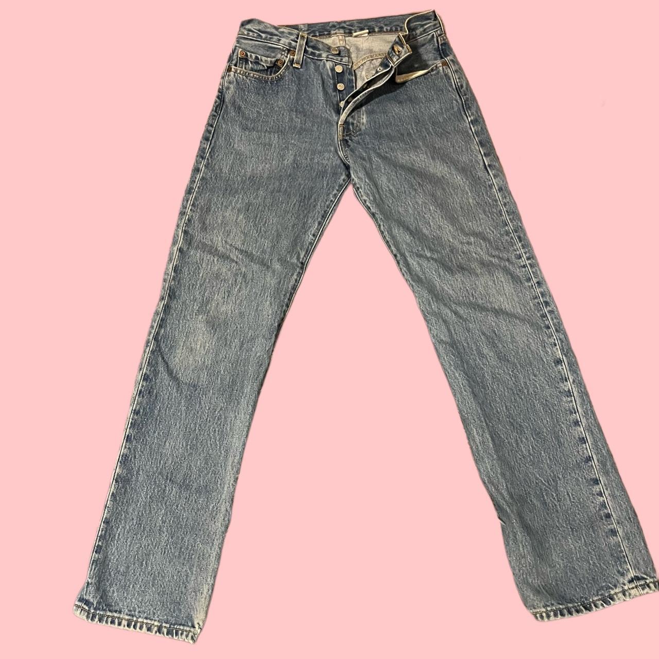 Jeans with hot sale multiple buttons