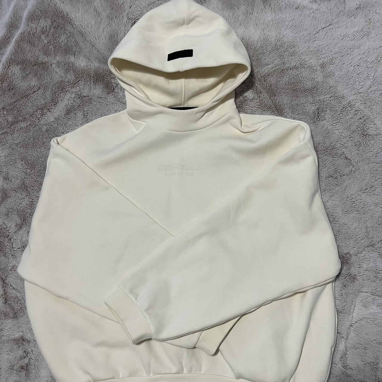 white fear of god essentials hoodie size small fits... - Depop