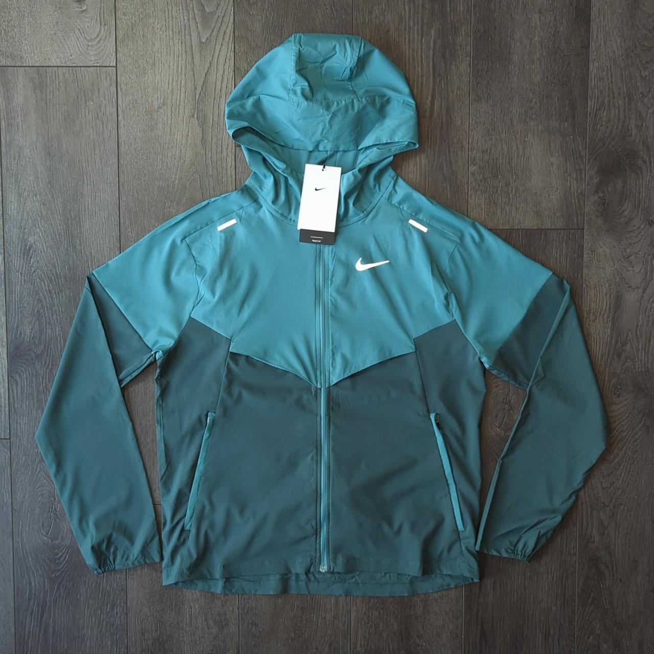 Nike windbreaker jacket price hot sale