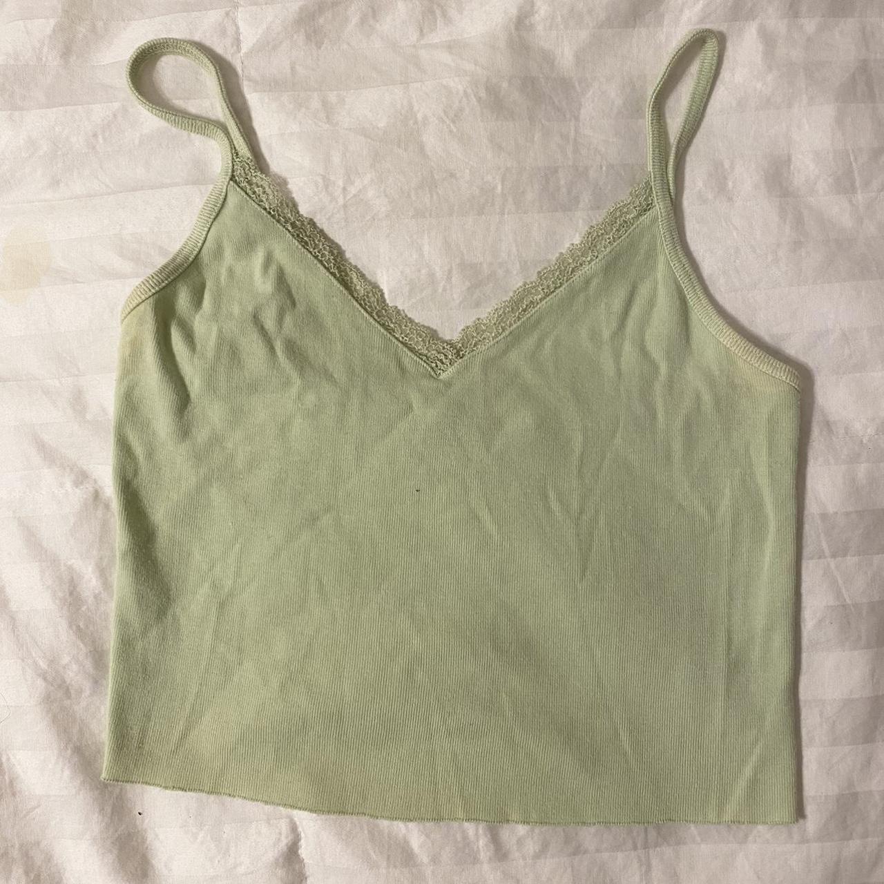 Brandy Melville green lace tank Discoloration at... Depop