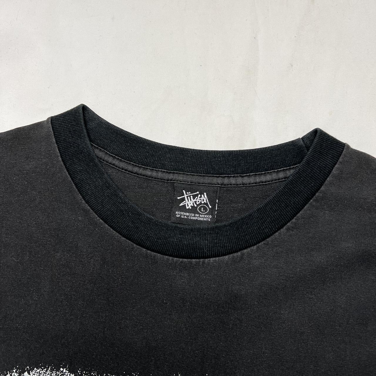 Vintage Stussy T-Shirt Black with print to chest,... - Depop