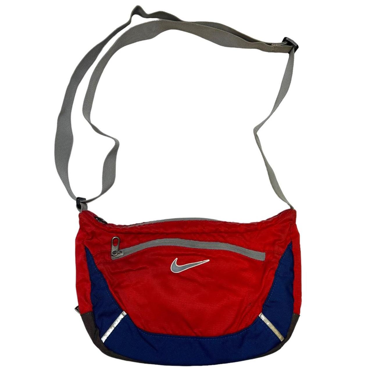 red nike cross body bag