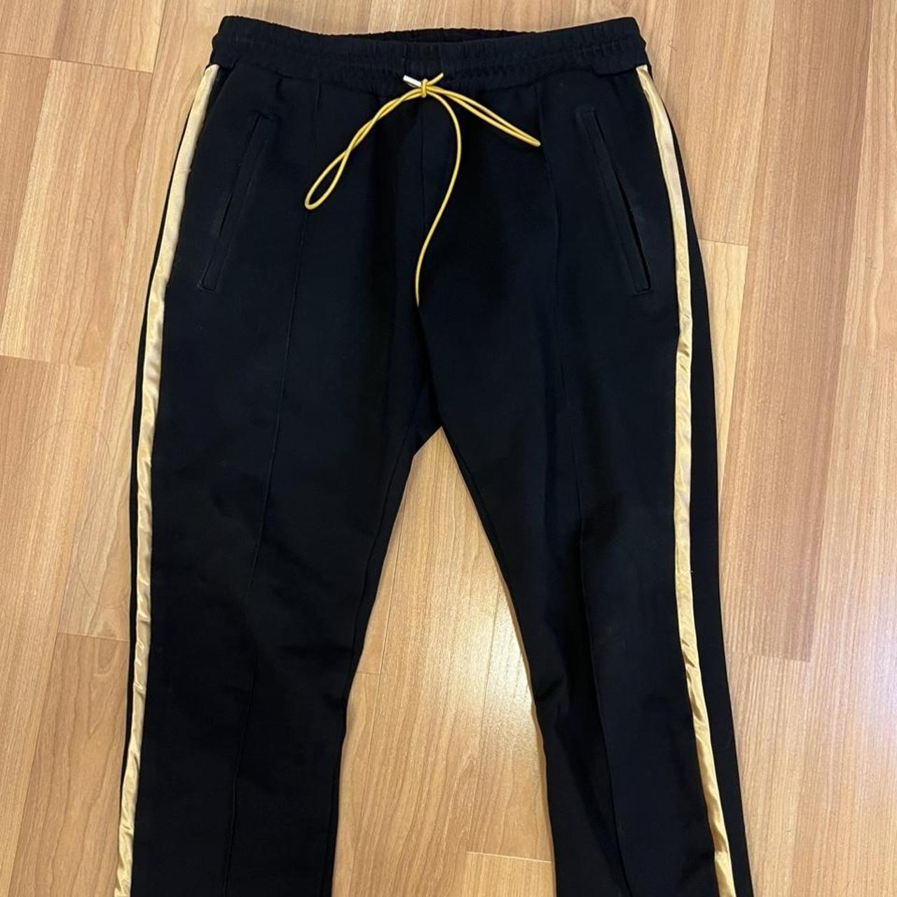 Rhude Men's Black and Gold Joggers-tracksuits | Depop