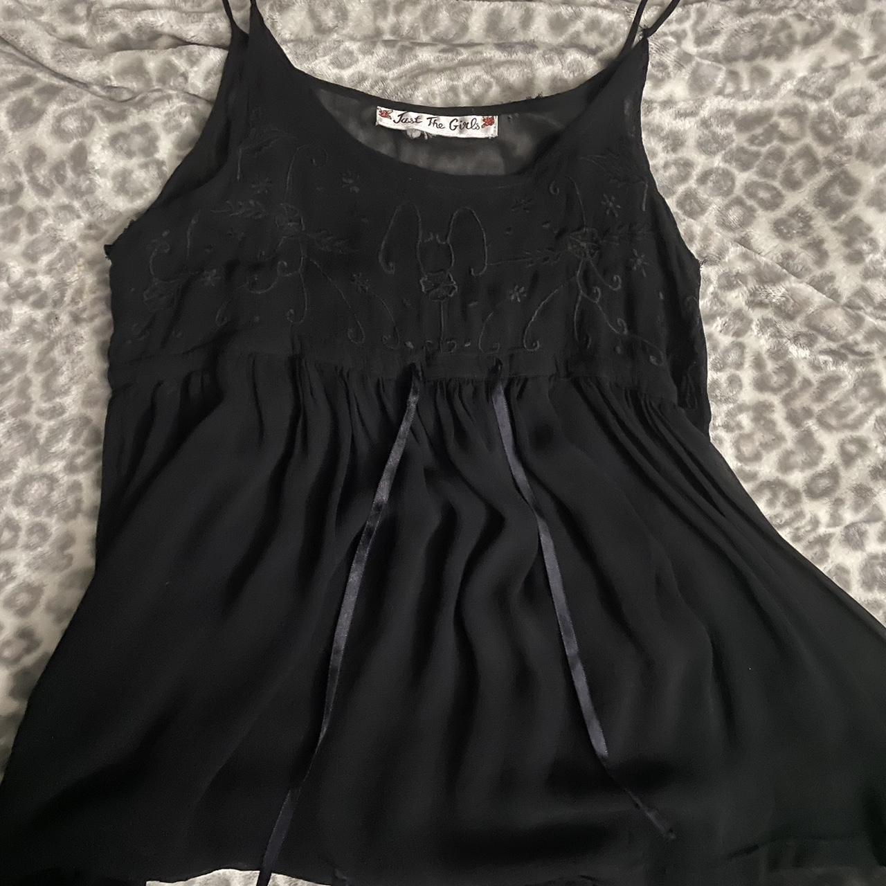 Black baby doll top size tag is messed up but would... - Depop