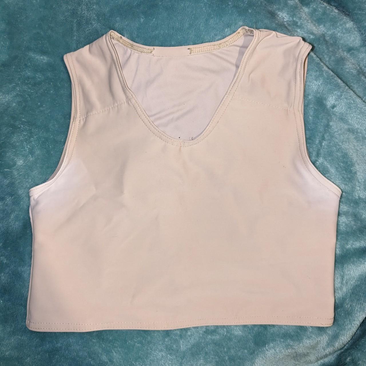 gc2b beige chest binder in XL has some wear and... - Depop