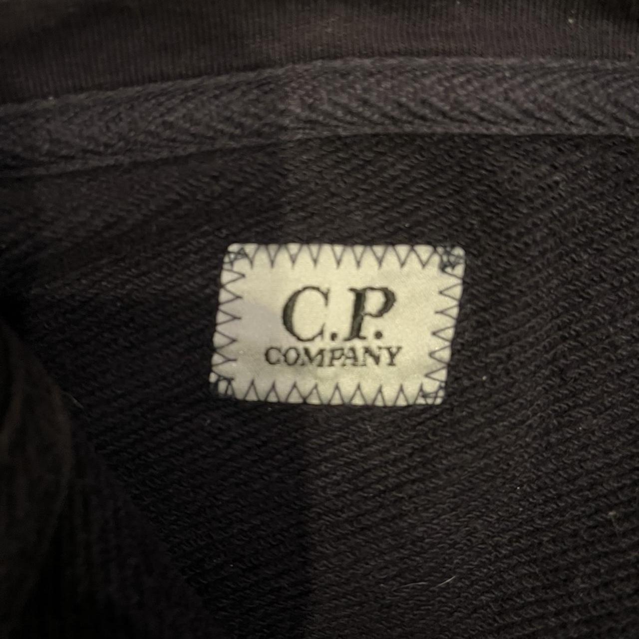 CP Company Men's Black Hoodie | Depop