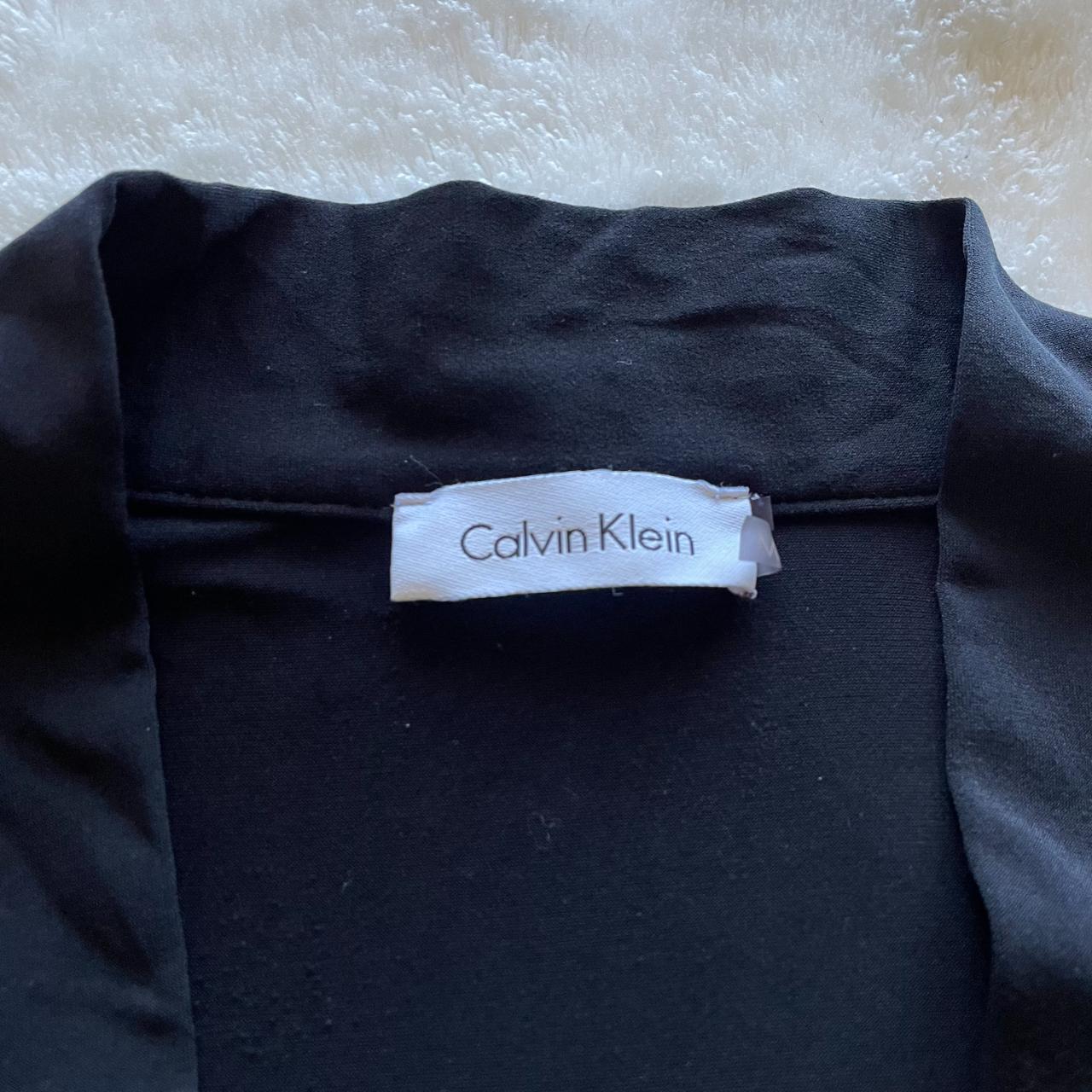 Calvin Klein Black Shrug Cutest little shrug,... Depop