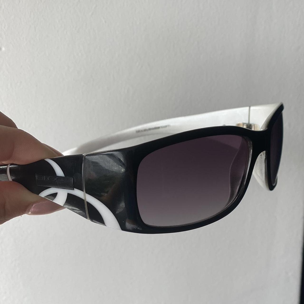 Bloc sunglasses Black with white swirl design Depop