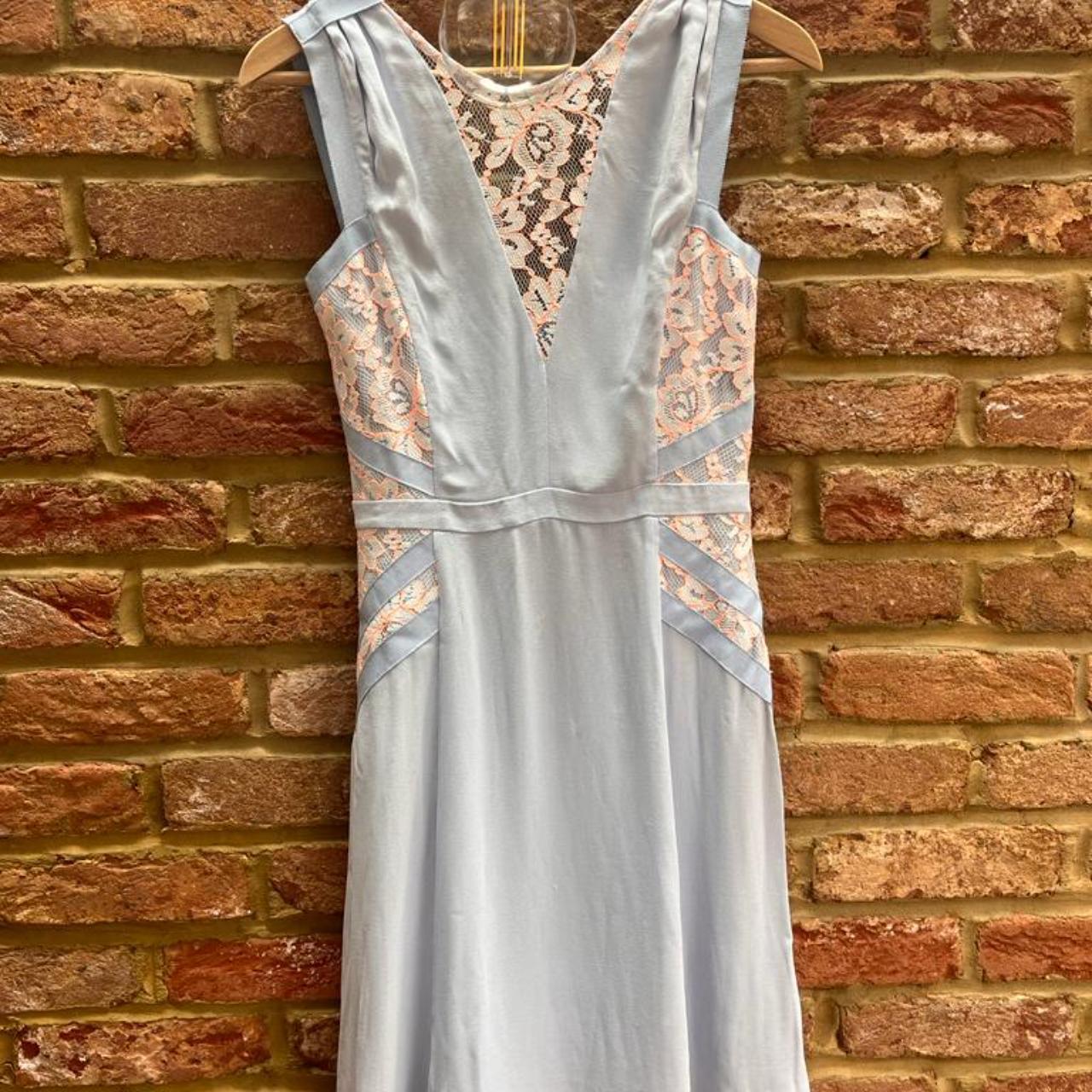 Light blue dress with orange flower lace detail Depop