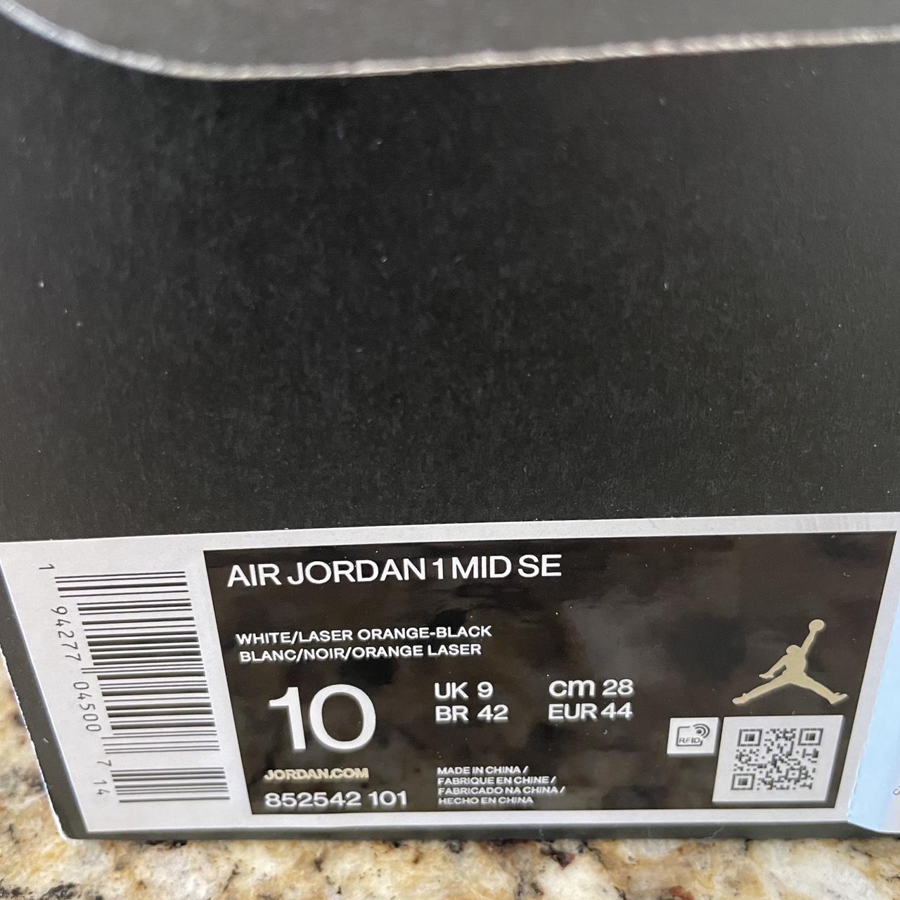 green and orange jordans