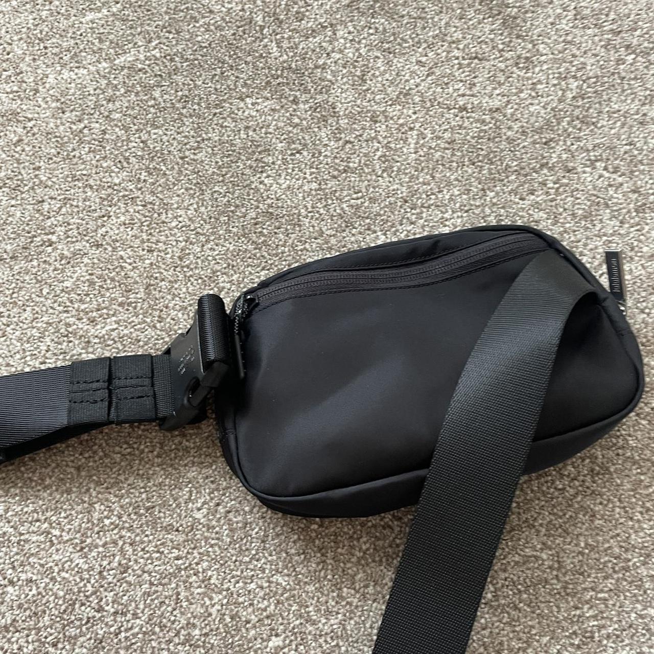 Black Lululemon belt bag Never worn mint condition... Depop