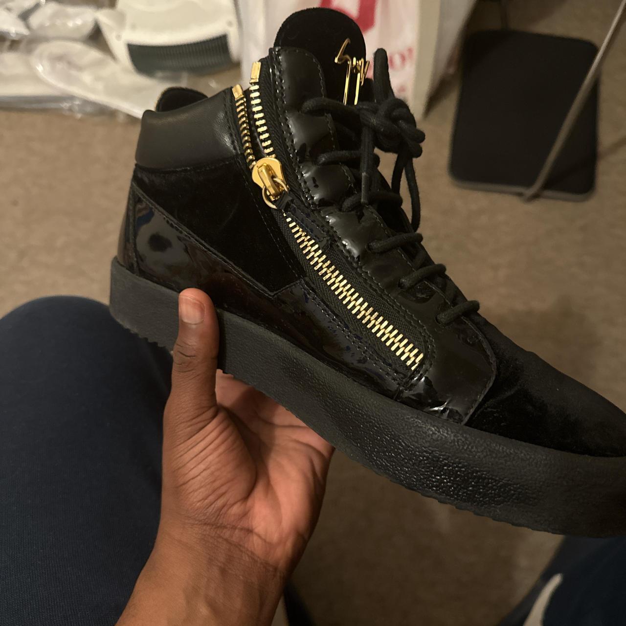 Black and gold Giuseppe Zanotti high top
