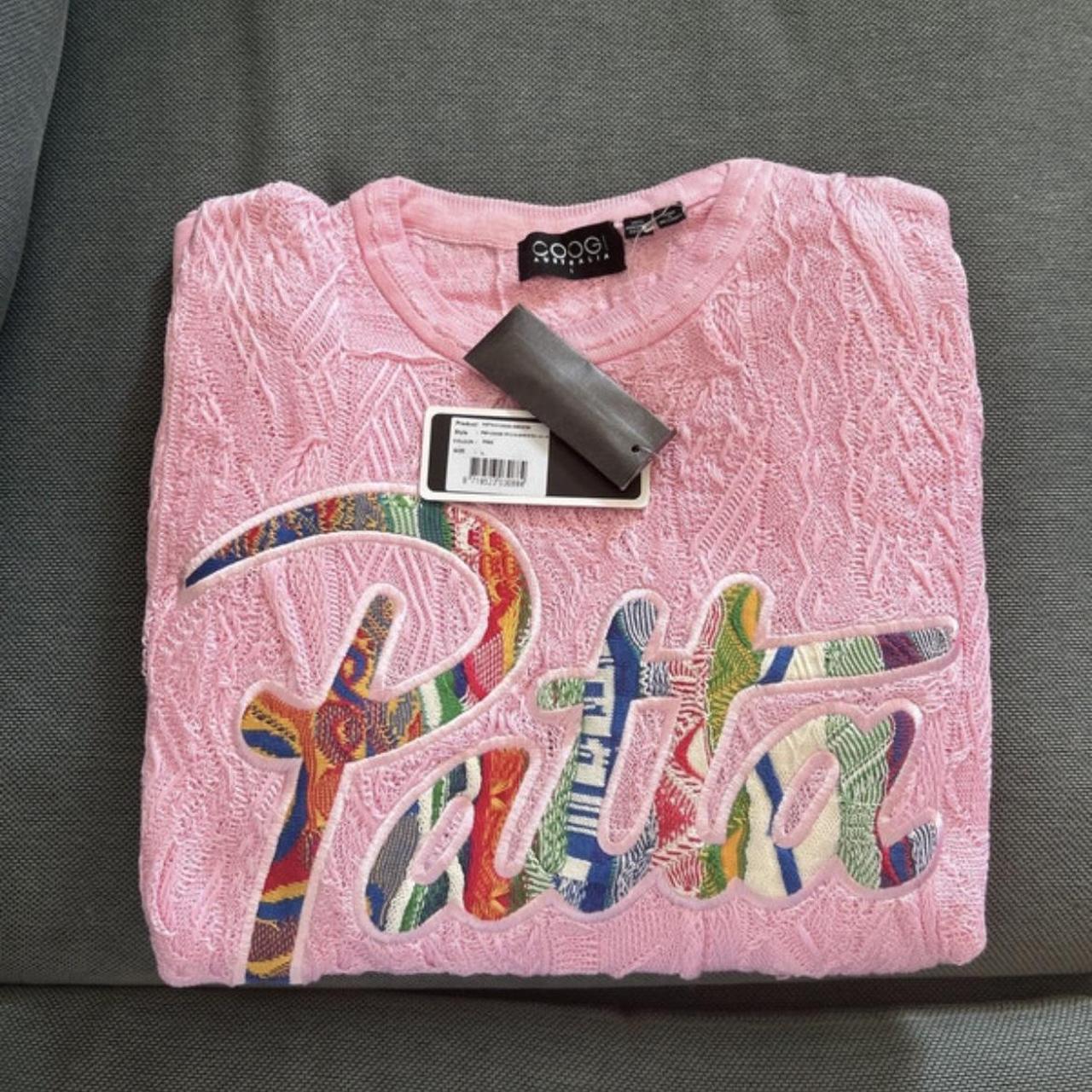 Pink coogi sweater best sale