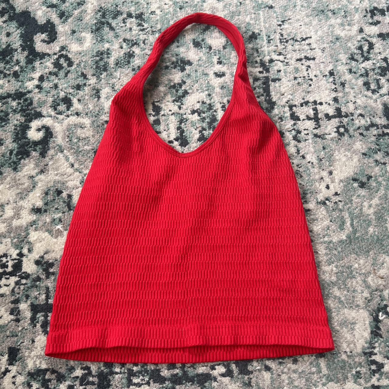 - red halter top - worn a couple times, no flaws -... - Depop