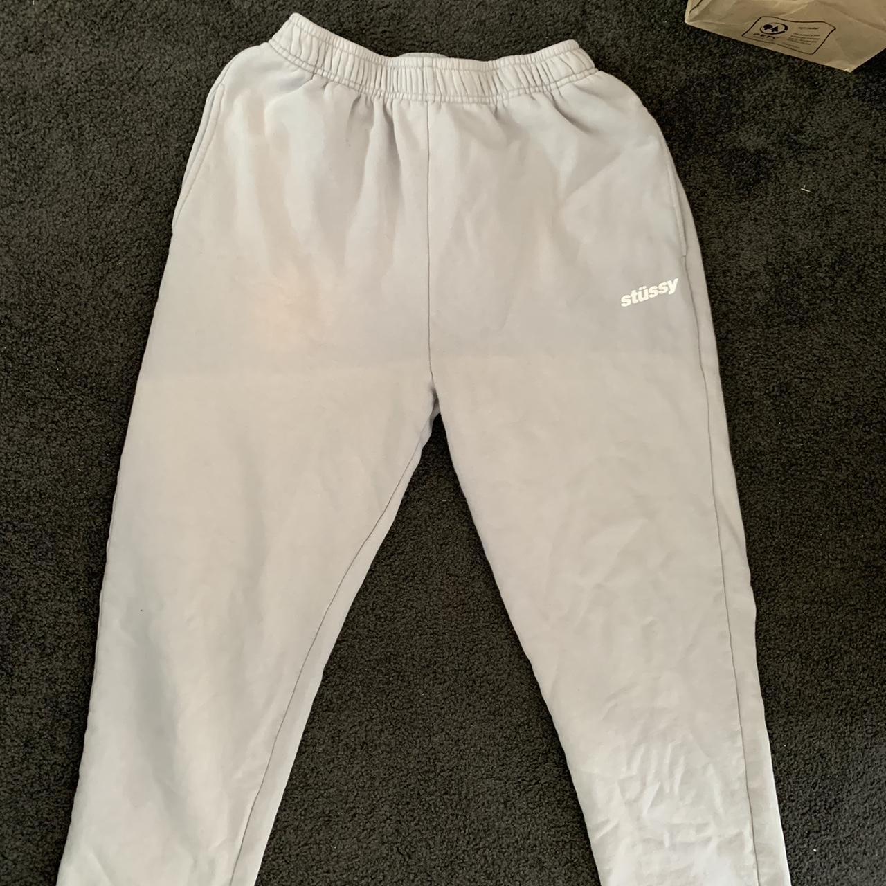 light grey track pants, some fading and... - Depop