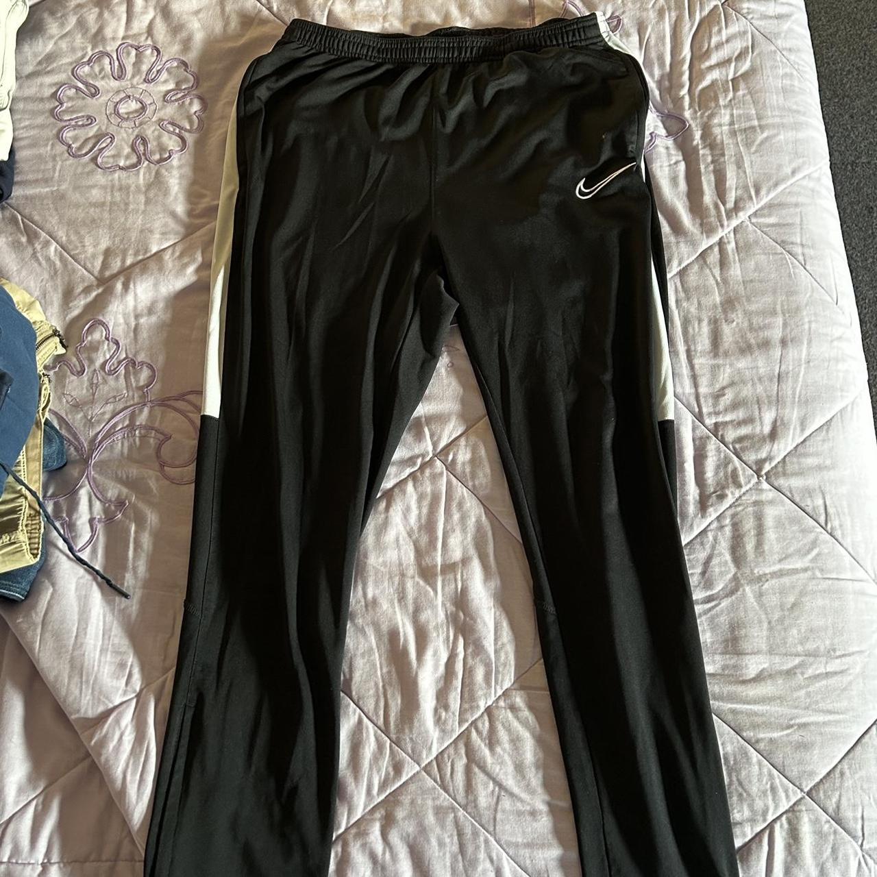 mens nike tracksuit bottoms with zip pockets