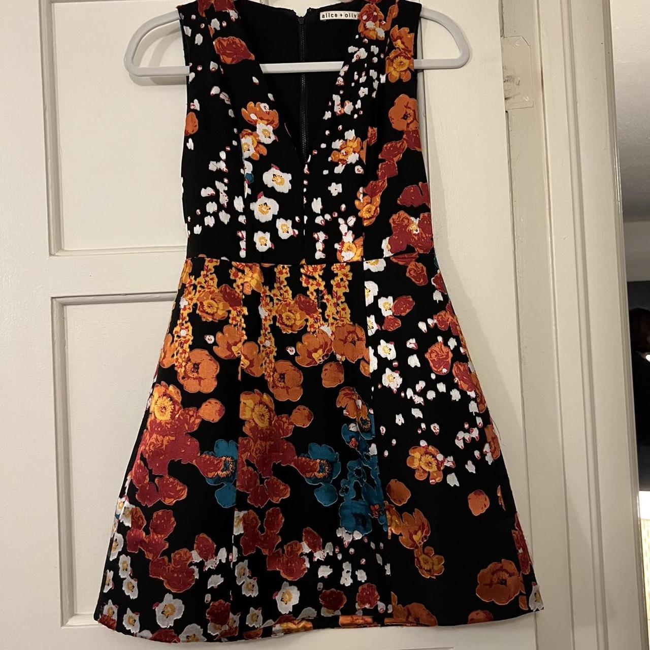 Alice and Olivia black floral mini dress. Flowers... - Depop